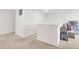 Hallway featuring carpeted floors, white trim, and a view of moving boxes at 7517 Heben Dr, Indianapolis, IN 46113