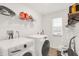 Laundry room with washer, dryer and shelf at 7517 Heben Dr, Indianapolis, IN 46113