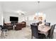 Open concept: living room flows seamlessly into a dining area and the kitchen at 7517 Heben Dr, Indianapolis, IN 46113