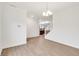 Open-concept living area showcasing hardwood floors and a neutral color palette at 7517 Heben Dr, Indianapolis, IN 46113