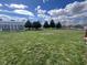 Expansive backyard with mature trees, a utility shed, and lush green grass at 791 W 500 S, Greenfield, IN 46140