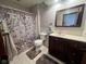 Bathroom with a vanity, toilet, decorative shower curtain, and tile flooring at 791 W 500 S, Greenfield, IN 46140