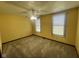 Bedroom featuring neutral carpet, a ceiling fan, and dual windows at 791 W 500 S, Greenfield, IN 46140