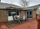 Cozy deck area with outdoor seating and an awning, ideal for enjoying the outdoors in comfort and style at 791 W 500 S, Greenfield, IN 46140