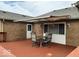 Relaxing outdoor deck with a table, seating, and a retractable awning at 791 W 500 S, Greenfield, IN 46140