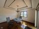 Cozy dining room with chandelier, window, hardwood floors, and seating for two at 791 W 500 S, Greenfield, IN 46140