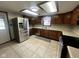 Spacious kitchen with modern stainless steel appliances, bright countertops, and tiled flooring at 791 W 500 S, Greenfield, IN 46140