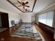 Spacious living room featuring hardwood flooring, recessed ceiling, and natural light at 791 W 500 S, Greenfield, IN 46140