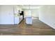 Bright and airy living space with modern flooring, a sleek kitchen, and ample natural light at 8525 E 42Nd Pl, Indianapolis, IN 46226