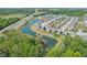Aerial view of the neighborhood, with ponds, trees and sidewalks at 9723 Violet Cir, Indianapolis, IN 46239