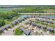 Aerial view of the neighborhood with ponds, green spaces, and sidewalks at 9723 Violet Cir, Indianapolis, IN 46239
