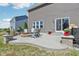 Charming backyard featuring a fire pit, patio area, and landscaped surroundings for outdoor enjoyment at 9723 Violet Cir, Indianapolis, IN 46239