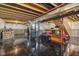 Unfinished basement with open ceiling and sealed flooring, and utilities at 9723 Violet Cir, Indianapolis, IN 46239