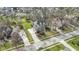 View of a house with an extended driveway and a basketball hoop on a well-manicured lawn at 9931 Woodlands Dr, Fishers, IN 46037