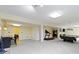 Finished basement featuring a bar area, workout space, and ample room for recreation at 9931 Woodlands Dr, Fishers, IN 46037
