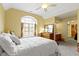 Bedroom featuring a bright, natural light, wooden dresser and yellow colored walls at 9931 Woodlands Dr, Fishers, IN 46037