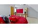 Bedroom featuring a queen sized bed, wooden door and closet access at 9931 Woodlands Dr, Fishers, IN 46037