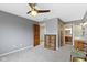 The bedroom features carpet floor and ensuite bathroom with wood cabinets at 9931 Woodlands Dr, Fishers, IN 46037
