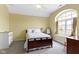 Cozy bedroom with bright, natural light and neutral colored walls, creating a calming ambiance at 9931 Woodlands Dr, Fishers, IN 46037