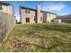 Large backyard offering ample space for recreation and entertaining; ready for summer enjoyment at 10453 Apple Creek Dr, Indianapolis, IN 46235