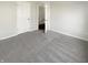 Carpeted bedroom with neutral colored walls and a closet at 10453 Apple Creek Dr, Indianapolis, IN 46235