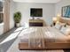 Serene main bedroom features a large window, a dresser, and a stylish bed at 10453 Apple Creek Dr, Indianapolis, IN 46235