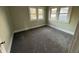 Inviting bedroom with neutral paint, new carpet, and natural light at 1124 Victory Ct, Anderson, IN 46016