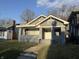 Inviting single-story home featuring a covered front porch and traditional design at 1124 Victory Ct, Anderson, IN 46016