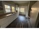 Functional kitchen area with ample cabinet space, stainless steel appliances, and hardwood floors at 1124 Victory Ct, Anderson, IN 46016