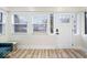 Bright entryway featuring modern flooring, ample natural light, and neutral paint at 1331 N Grant Ave, Indianapolis, IN 46201