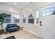 Bright entryway featuring modern flooring, ample natural light, and neutral paint at 1331 N Grant Ave, Indianapolis, IN 46201