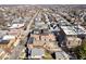 An aerial view of the apartment building's rooftop decks, showing the surrounding neighborhoods and streets at 1529 N Alabama N St # B, Indianapolis, IN 46202