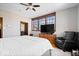 Bright bedroom featuring large windows, a comfortable bed, and a cozy seating area at 1529 N Alabama N St # B, Indianapolis, IN 46202