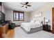 Inviting bedroom featuring soft lighting, a plush rug, and a comfortable queen size bed at 1529 N Alabama N St # B, Indianapolis, IN 46202