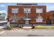 Stunning brick building showcasing arched windows and landscaping, located in a vibrant neighborhood at 1529 N Alabama N St # B, Indianapolis, IN 46202