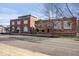 Brick building featuring an inviting front entrance with arched windows, plus professionally landscaped grounds at 1529 N Alabama N St # B, Indianapolis, IN 46202