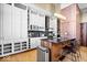 Open kitchen featuring a central island with bar seating and stainless steel appliances at 1529 N Alabama N St # B, Indianapolis, IN 46202
