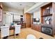 Open-concept living room, kitchen, and dining area with hardwood floors and ample natural light at 1529 N Alabama N St # B, Indianapolis, IN 46202