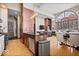 Spacious open-concept living and kitchen area with hardwood floors and natural light at 1529 N Alabama N St # B, Indianapolis, IN 46202