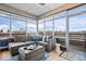 Relaxing sunroom with comfortable seating, large windows, and scenic views at 1529 N Alabama N St # B, Indianapolis, IN 46202