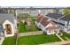 Aerial view of the home and its surrounding landscape and fence at 1655 Cornell Ave, Indianapolis, IN 46202