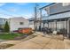 Backyard featuring a pergola, hot tub, privacy fence, and concrete patio at 1655 Cornell Ave, Indianapolis, IN 46202