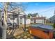 Backyard with hot tub and seating area with pergola, perfect for outdoor entertaining at 1655 Cornell Ave, Indianapolis, IN 46202