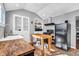 Bright kitchen features a butcher block countertop and island with tile floors at 1655 Cornell Ave, Indianapolis, IN 46202