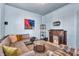 Comfortable living room with carpet, comfortable seating, stylish decor, and fireplace at 1655 Cornell Ave, Indianapolis, IN 46202