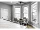 Bright dining area with four chairs and natural light at 1665 N College Ave, Indianapolis, IN 46202