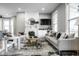 Bright living room with a fireplace, modern furnishings, and natural light, perfect for comfortable living at 1665 N College Ave, Indianapolis, IN 46202