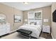 Stylish bedroom with a luxurious bed, elegant furnishings, and modern decor at 2282 Creekland Dr, Columbus, IN 47201