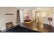 The bonus room has wood laminate floors and decorative elements at 2282 Creekland Dr, Columbus, IN 47201