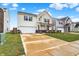 Attractive two-story home with a well-kept lawn, a paved driveway, and curb appeal in a friendly neighborhood at 2282 Creekland Dr, Columbus, IN 47201